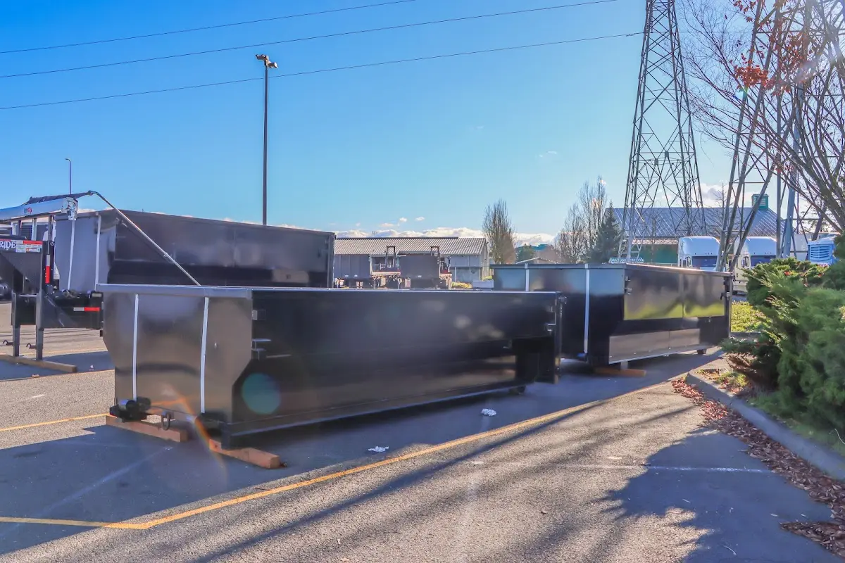 Roll-off dumpster ready for waste disposal at job site for 12 Yard Dumpster Rental in Fox Crossing